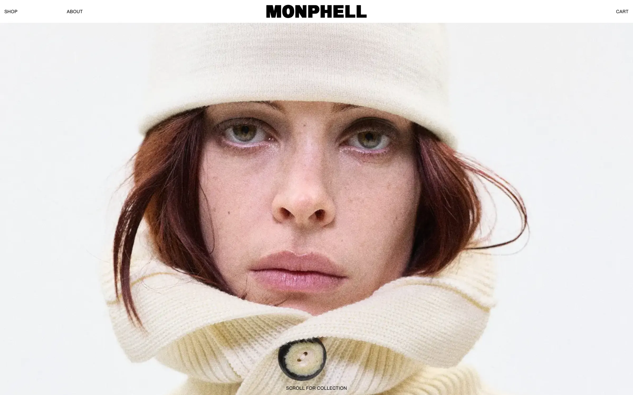 The Monphell homepage: a close portrait of a model in a cream knit hat and collar under the black MONPHELL wordmark